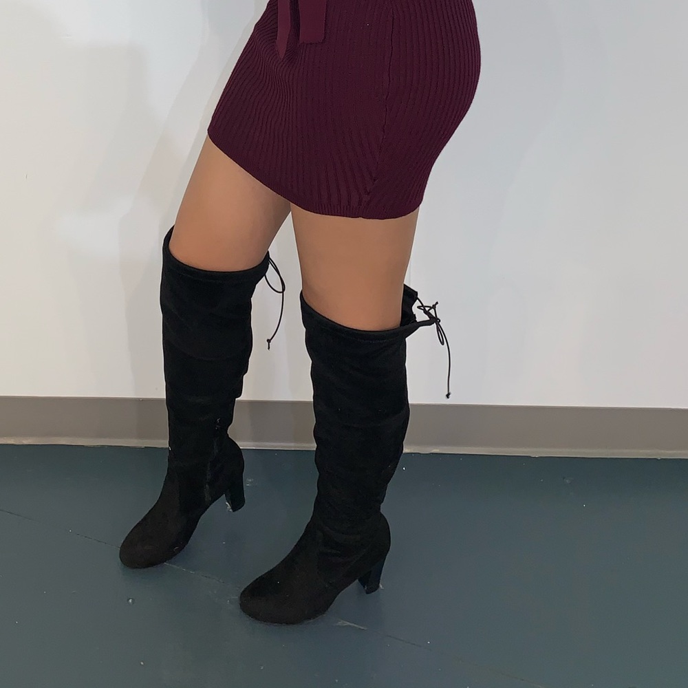 Knee high heeled boots